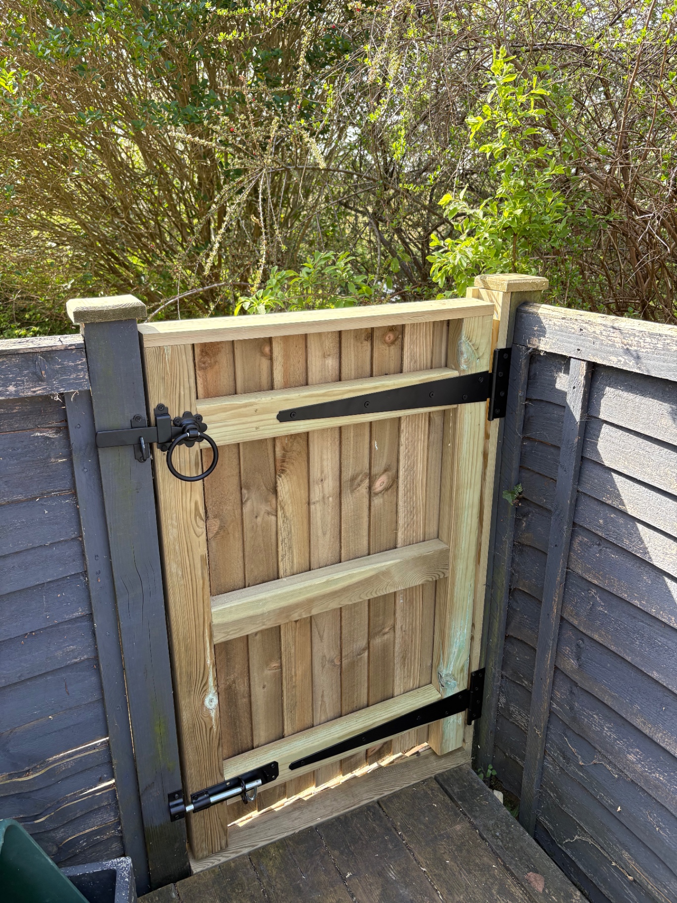 Bespoke timber garden gate with black ironmongery